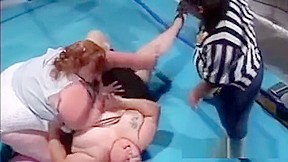 Lesbian sumo wrestlers strip during fight...