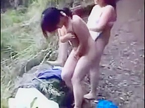 Asian Women Get Nude Outside...