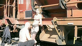 Teeen blonde tied to a train,...
