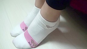Chinese footjob with socks on pants...