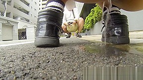 Teenage asian redhead filmed while peeing street...