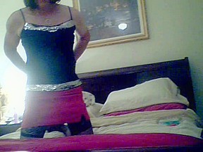 Latex corset dildoing...