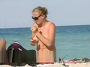 Nude beach voyeur films women...