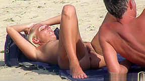 Blonde milfs tanning naked at beach...