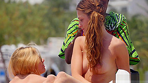 Group Of Hot Topless Girls Sunbathing...