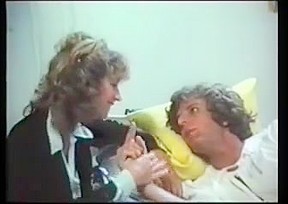 Busty nurse fucks in a classic porn movie