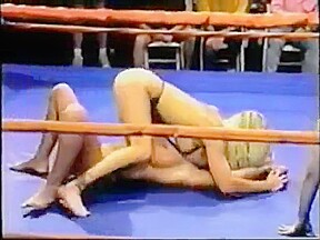 Topless ring wrestling...