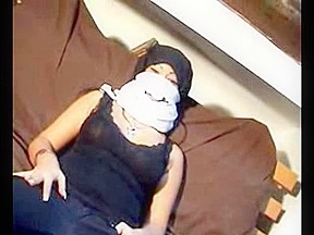 Masked arabic lady on tape...