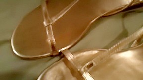Gold sandals palying...