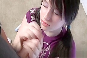 Petite girl with pigtails gives her first hand job