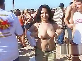 Grabbing latina boobs at the beach...