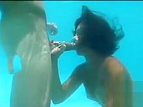 Underwater orgy oral sex...