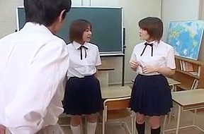 Two japanese school girl spitting on...