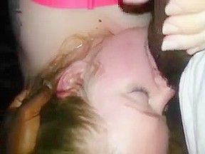 Blonde slut licking black balls...