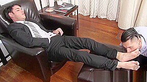 Handsome Businessman Strokes Cock While Are Licked...
