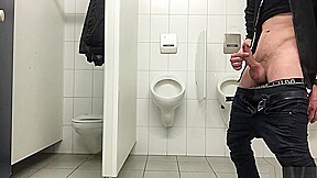 Pissing mens room not urinals but...