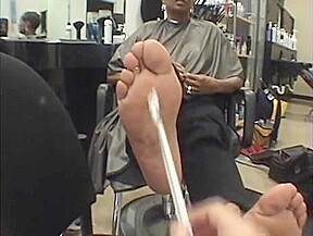 Smooth foot soles on mature ebony...