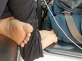 Candid tatoo feet in airport...