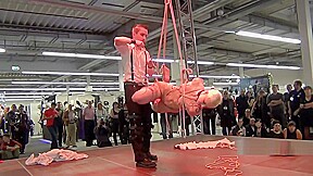 Bondage show in a shopping centre...
