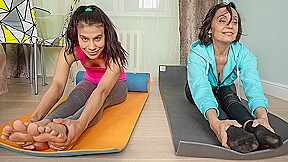 Lesbian yoga teacher seduces female student...