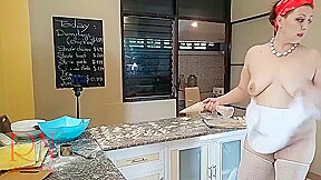 A Naked Housewife Is Preparing Dinner In The Kitchen. The Depraved Whimsical Housekeeper Works 44