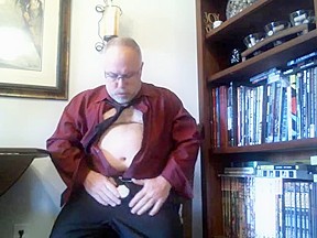 Mature suit strip with red wine...