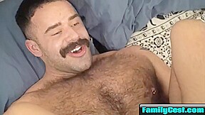 Hard by his hairy dad...