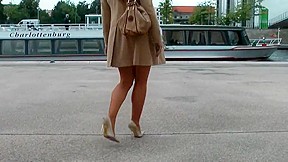 Classy lady strolling through berlin in...