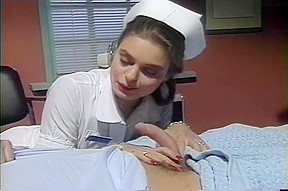 Beautiful nurse nancy gives her patient...