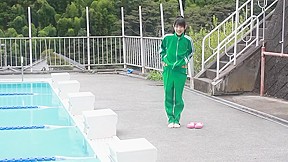 Japanese girl swim in pool with...