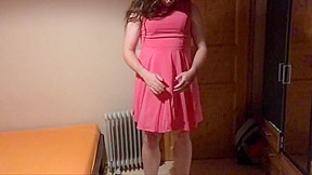 Sissy in pink dress strokes her...