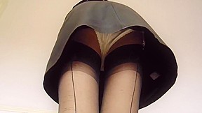 Black leather miniskirt stockings and panties...