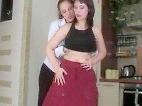 Two mature women are fucked strapon...
