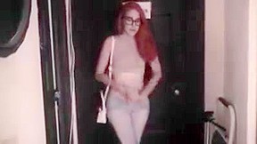 Redhead college girl pees her tight...