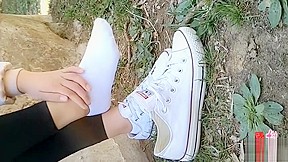 Chinese Girl Sprains Foot In Socks Leggings...