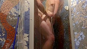 Undershower skinny milf shaving pussy hard...