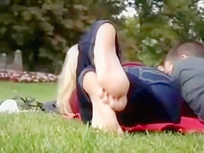Candid sexy soles blonde in park...