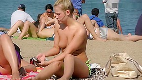 Beauty blonde babe Topless on the Beach