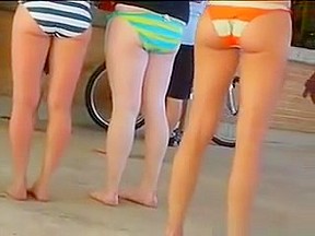 Sexy asses in bikini bottoms...