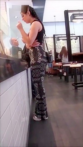 Candid jiggling booty in pattern pants...