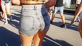 Candid hot college booty in tight jeans shorts...