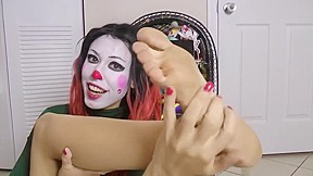 Sexy Clown Girl Shows Off How Big Her Feet Are...