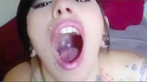 Girl opens wide tongue...