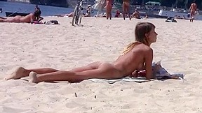 Nudist Girl Not Shy About Posing Nude Beach...