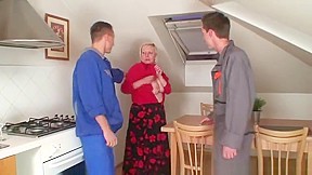 Naughty granny pleases two repairmen...