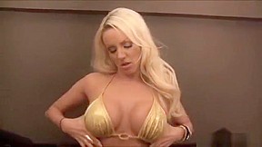 Gorgeous busty blonde talking dirty in...