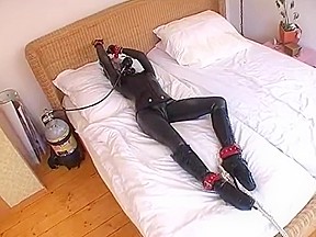 Girl in latex catsuit and wetsuit...