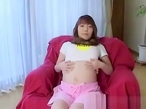 Pregnant asian shows her...