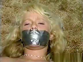 Cute blonde slave duct taped classic...