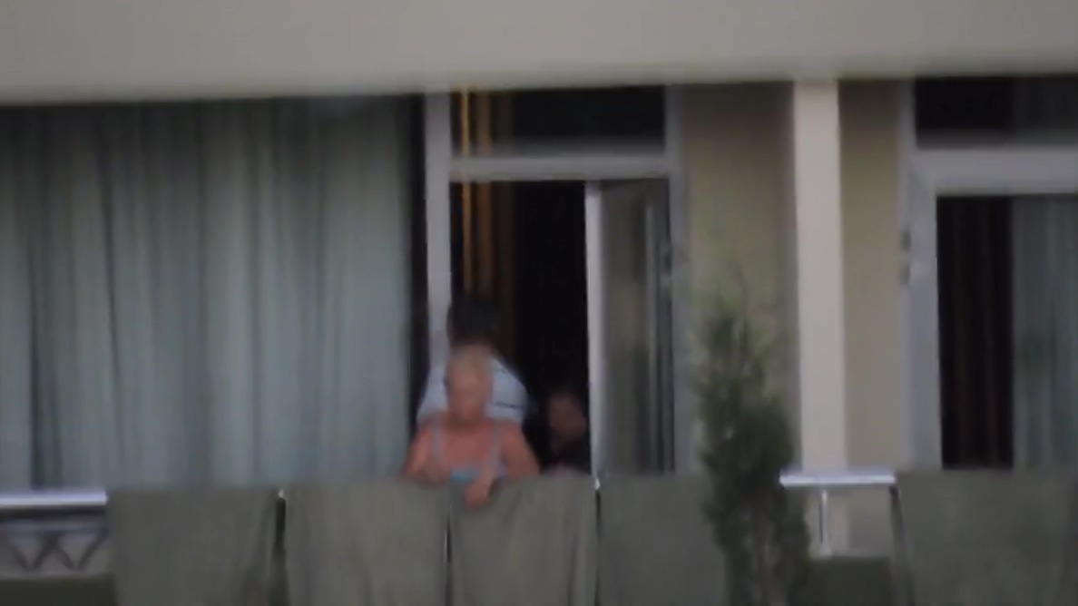 Amateur Hidden Cam Captures Mature Nudist Wife At The Window